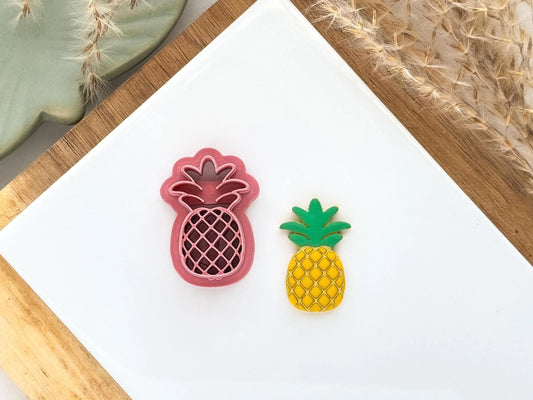Pineapple shaped cutter for polymer clay and silver clay with yellow and green clay cut out