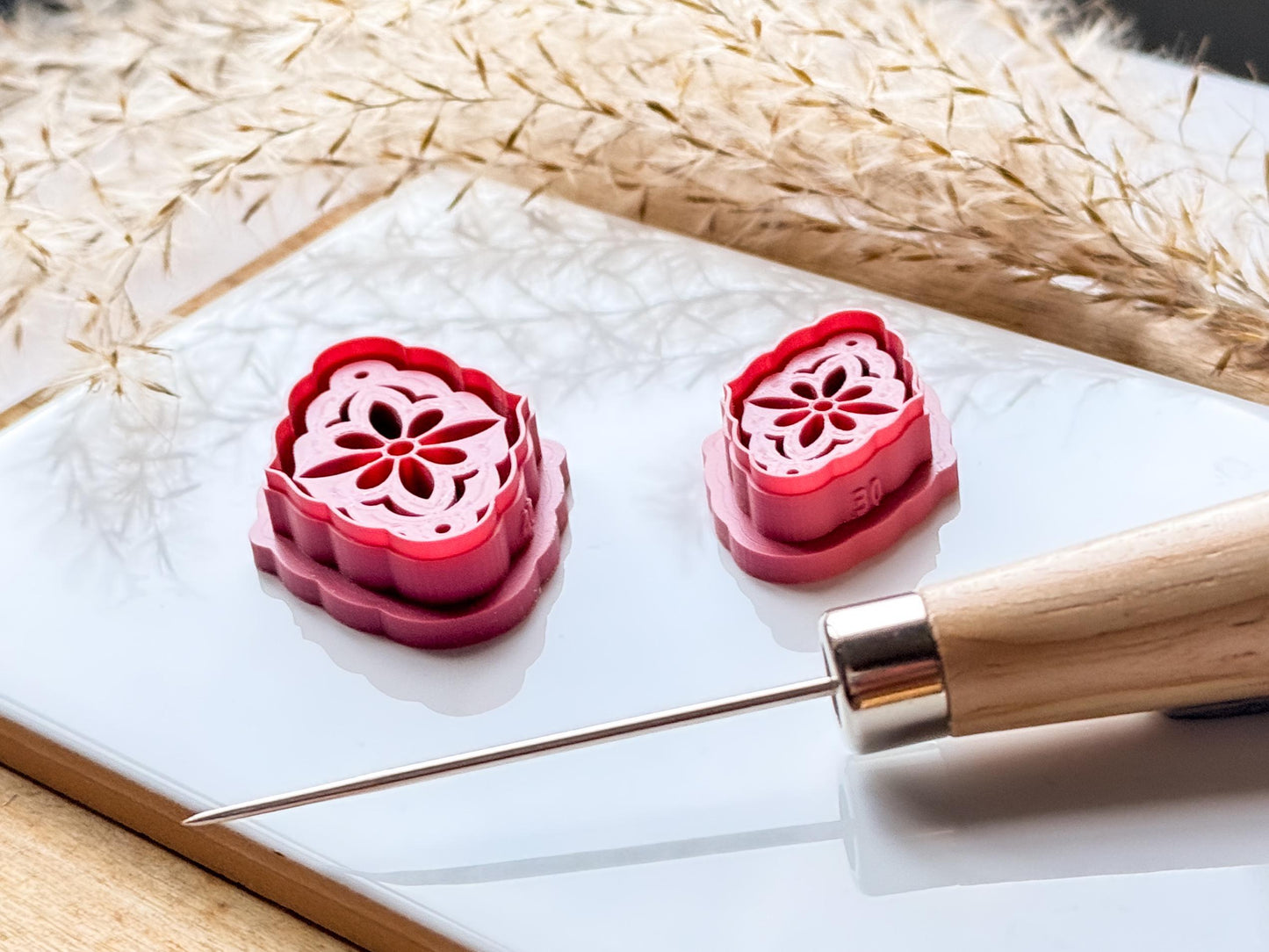 Side view of floral clay cutters to show debossing depth