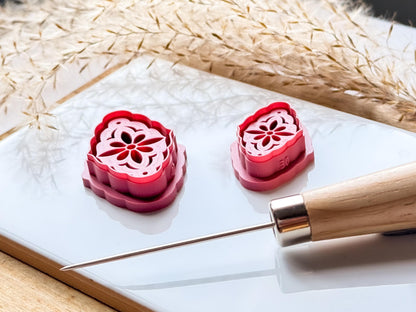 Side view of floral clay cutters to show debossing depth