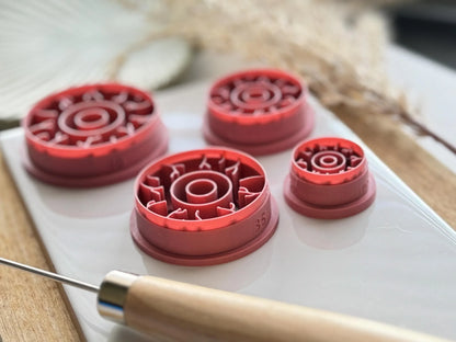 side view of several eyeball clay cutters