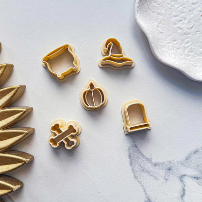 Example of larger size beige 20 mm Halloween clay cutters for stud earrings.