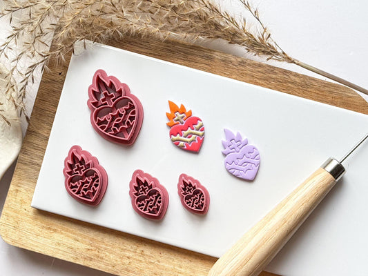 Flaming sacred heart polymer clay cutters with samples