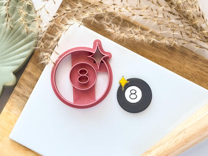 8 ball clay cutter with shine star on white tile