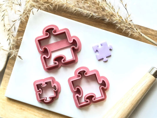 Jigsaw puzzle piece clay cutter in dark pink by fabled cutters uk