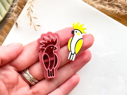 Cockatiel bird clay cutter in a hand for scale