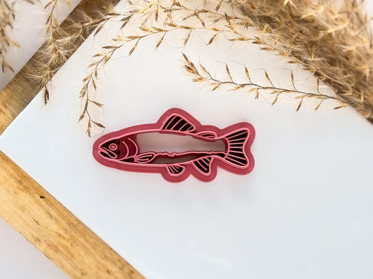 Pink trout fish shaped cutter with detailed stamp imprint lines for cutting polymer clay, silver clay and more.