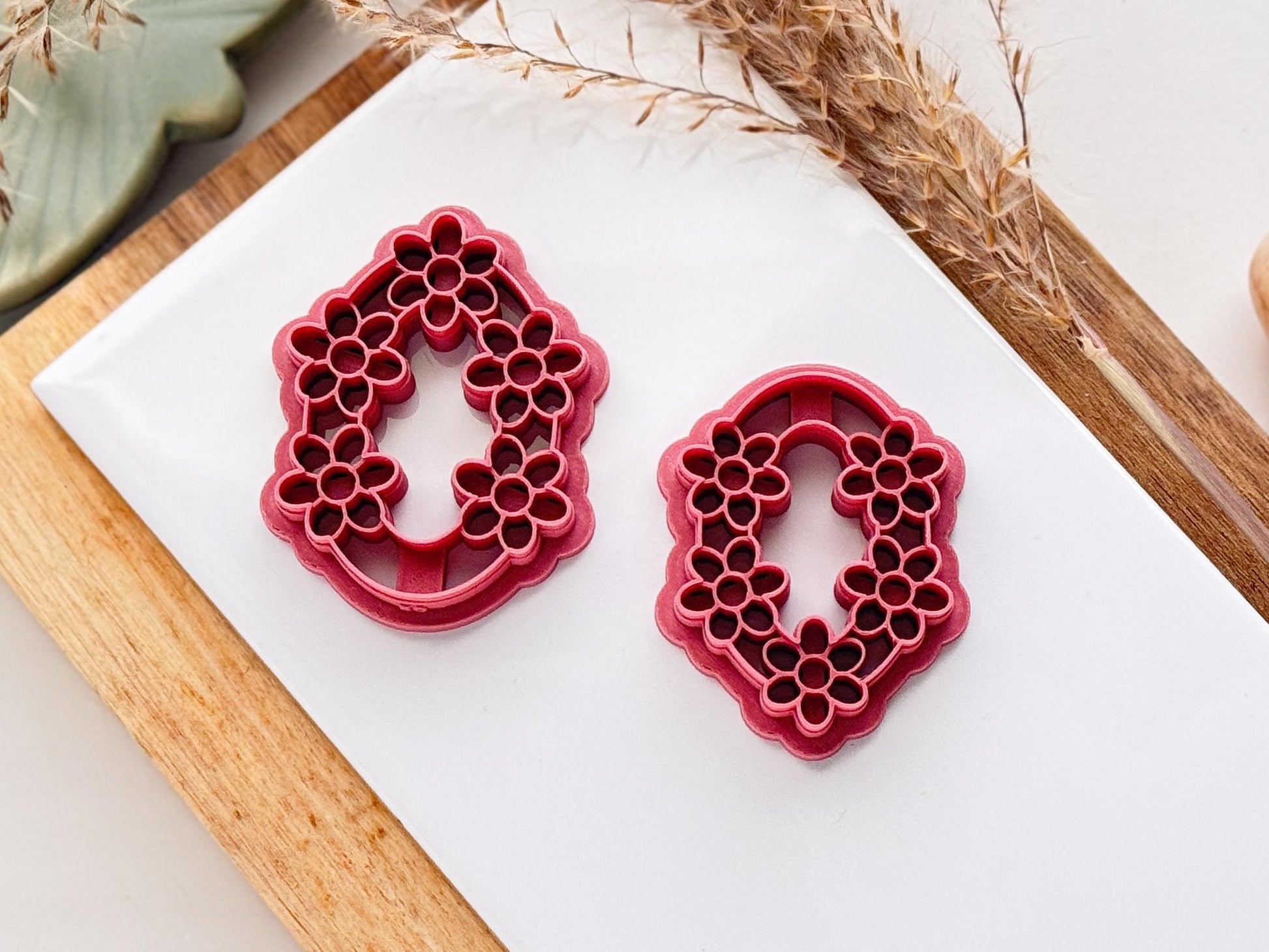 two oval clay cutters with flower shape details showing they can be used upsidedown