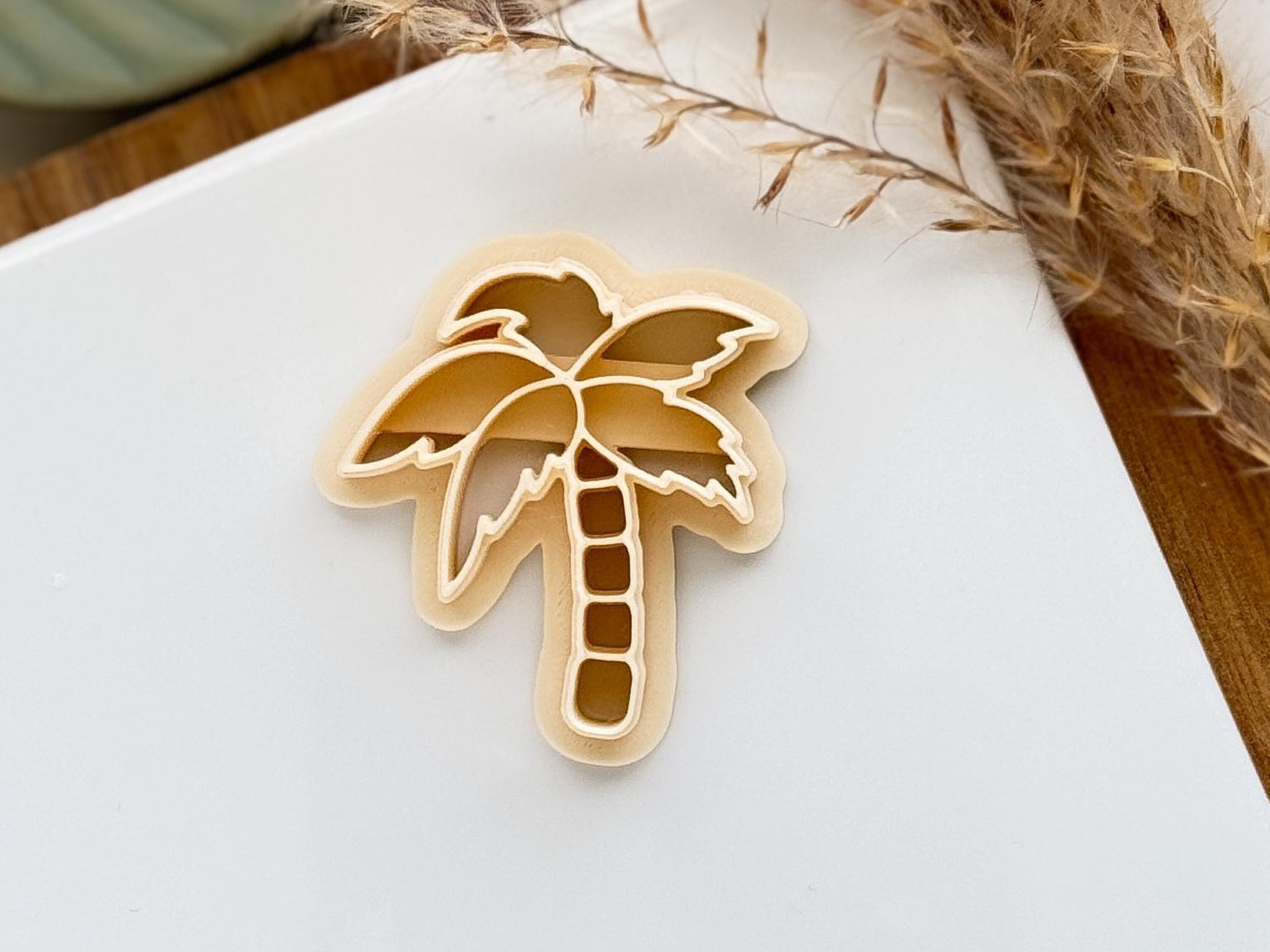 close up of beige coconut tree clay cutter