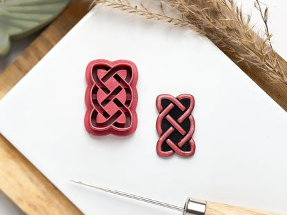 Rectangular celtic sailors knot shaped polymer clay cutter deep debossing sections to leave a raised rope knot shape