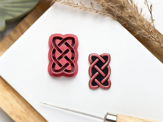 Rectangular celtic sailors knot shaped polymer clay cutter deep debossing sections to leave a raised rope knot shape