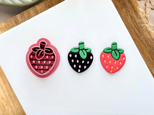 Strawberry shaped clay cutter with leaf, stem and pips stamp detail