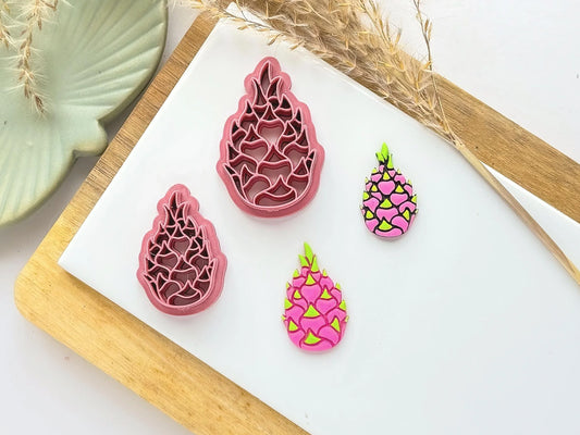 Tropical dragonfruit shaped clay cutter with pink and green polymer clay samples