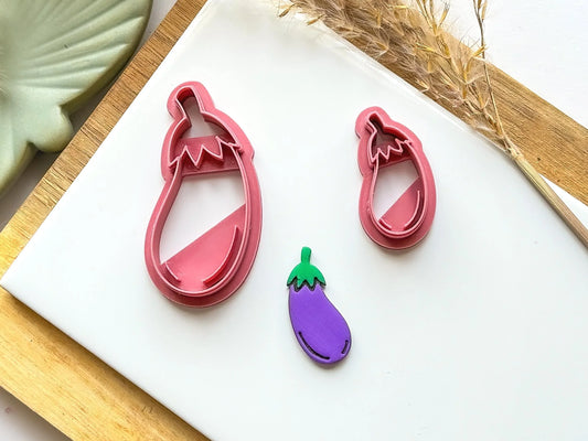 Aubergine shaped clay cutter with leaves and eggplant clay cut out