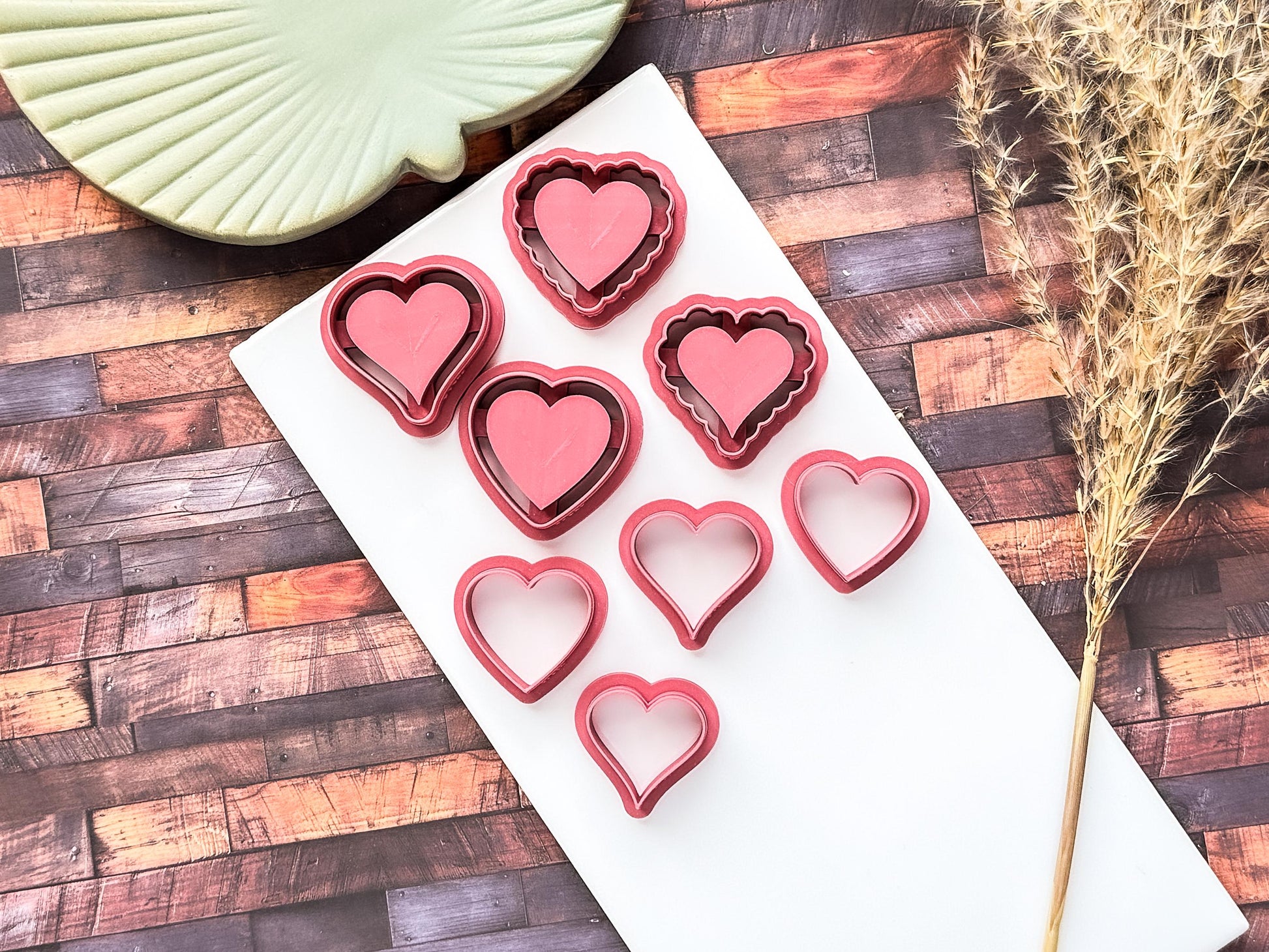 Valentine heart shaped bezel cutter set for clay and fondant onn a white tile