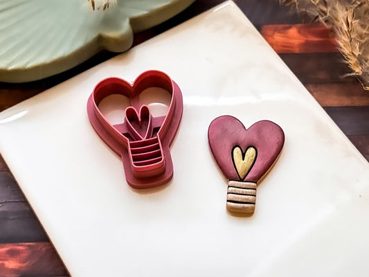 Polymer clay heart light bulb shapes made with Valentine's cutter