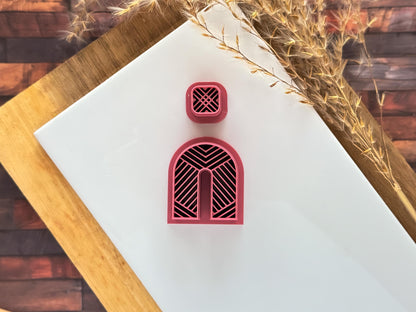 Polymer clay arch earring cutter with lined herringbone style pattern imprint design