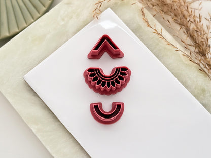 Set of 3 polymer clay earring cutters in geometric shapes with imprint details.