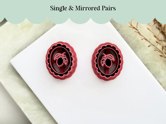 A mirrored pair of 3 cm mediterranean themed lemon polymer clay cutters within a scalloped edge oval frame. Designed for summer clay earring, brooch and jewellery making.