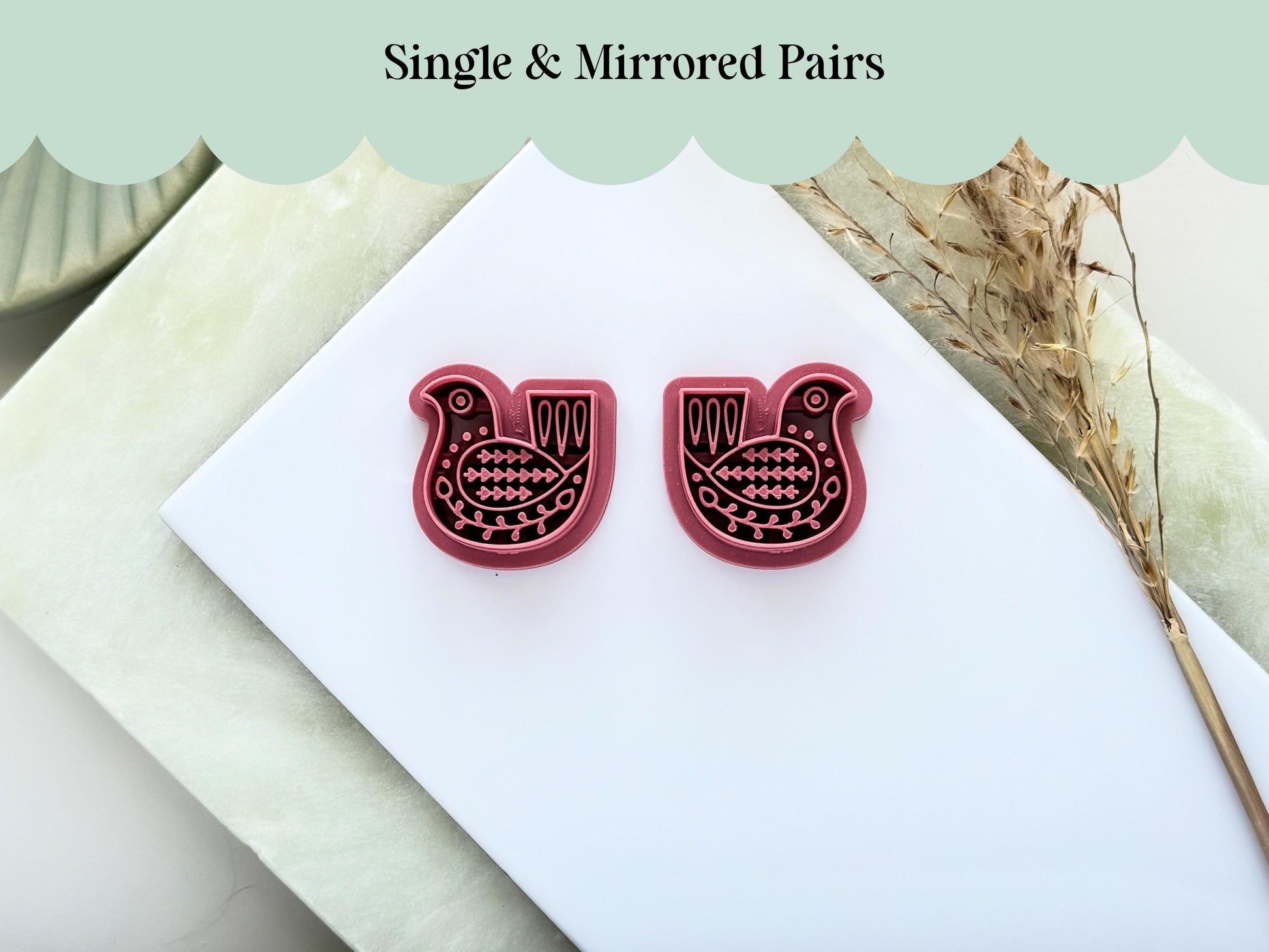 Mirroed pair of pigeon bird folk art style clay cutters with floral stamp details