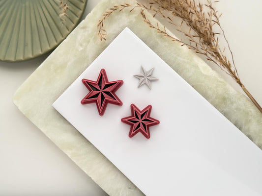 Six point star clay cutters in emo witchy style with debossed sections.