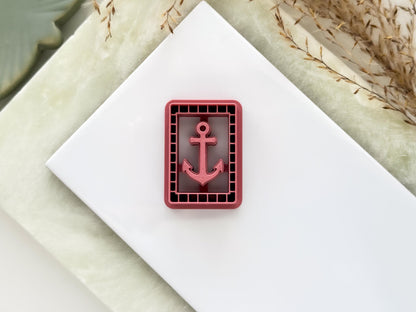 Rectangle shaped clay cutter with anchor stamp detail and lines. The cutter is pink and for making summer polymer clay earrings and jewellery
