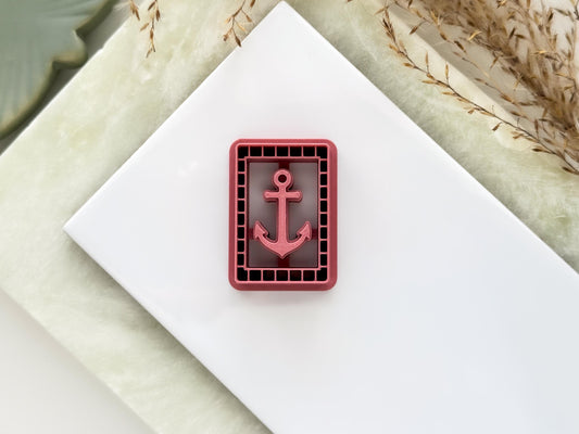 Rectangle shaped clay cutter with anchor stamp detail and lines. The cutter is pink and for making summer polymer clay earrings and jewellery