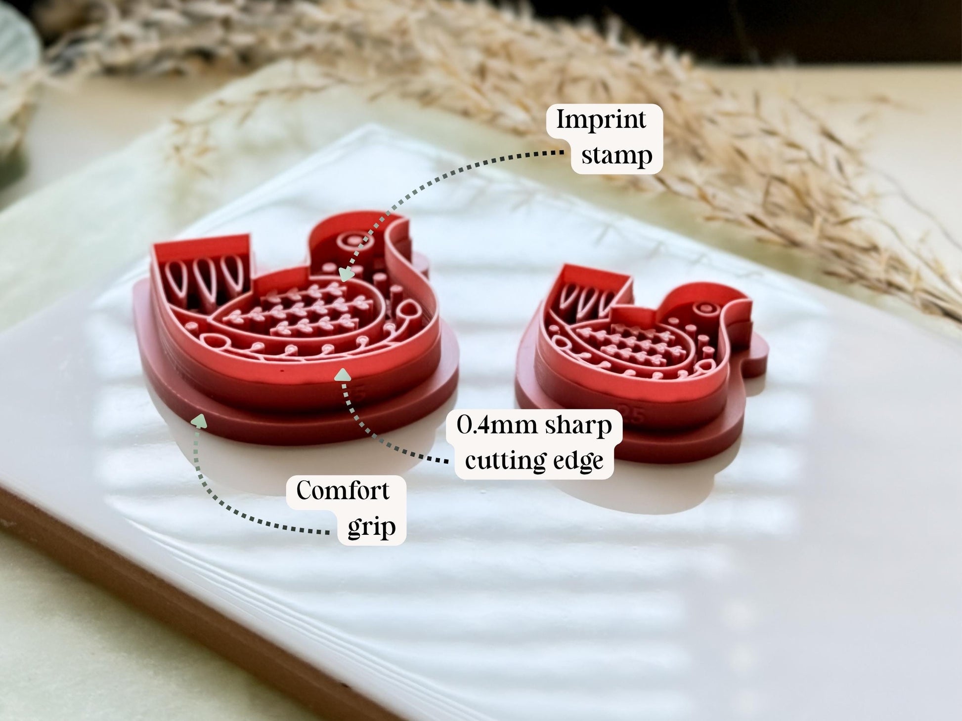 Folk art bird clay cutter details showing sharp cutting edge, stamping ddetails and comfort grip