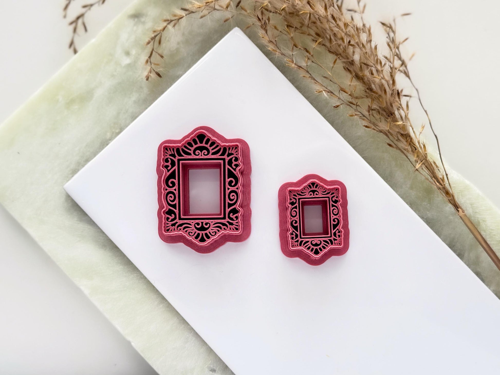 Rectangle ornate frame cutter in large and small for making polymer clay earrings. They feature intricate art deco style stamp details.