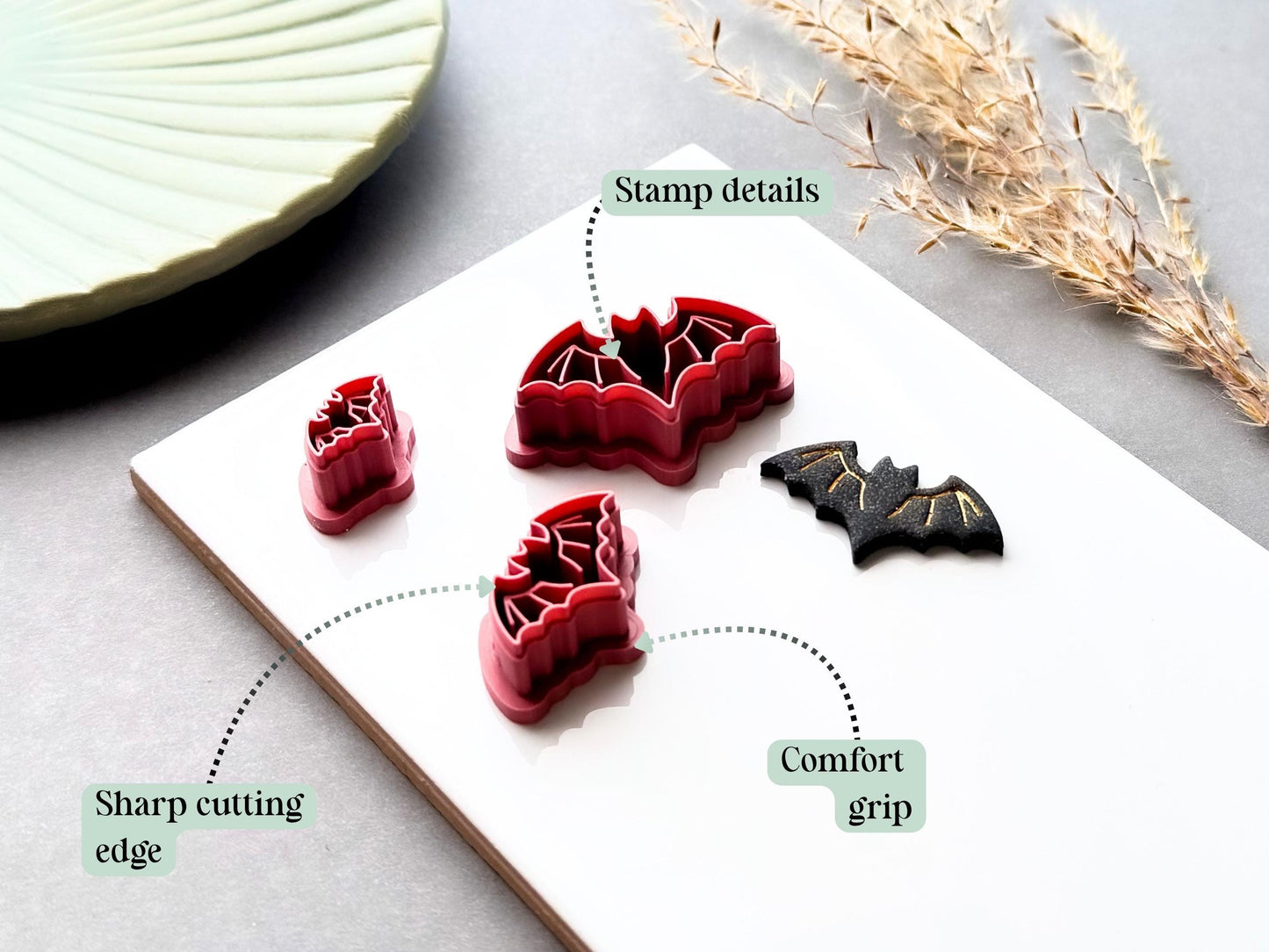 Bat polymer clay cutter feature graphic highlighting the detailed stamp design, sharp cutting edge and comfortable grip, shown alongside a matching finished bat clay embellishment.