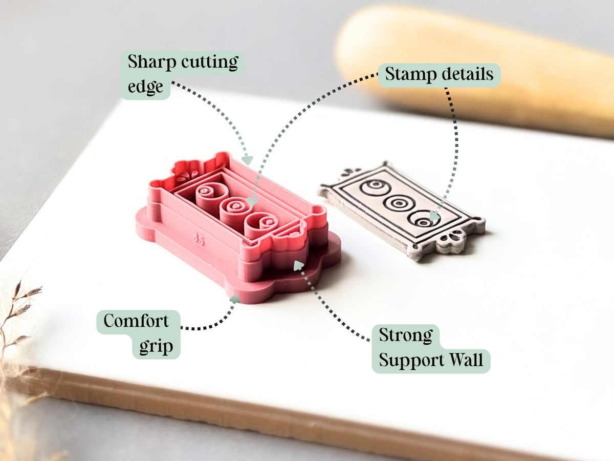 Feature graphic showing the rectangular frame clay cutter with three eyeball details, alongside a finished cream polymer clay cut-out. Labels highlight the sharp cutting edge, detailed stamp design, comfortable grip and strong support wall.