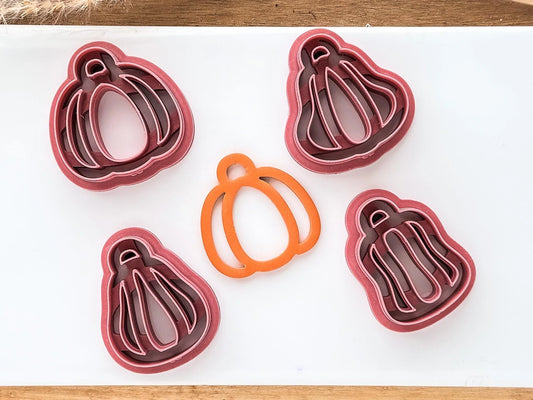 Set of 4 pumpkin clay cutters in an outline only style.