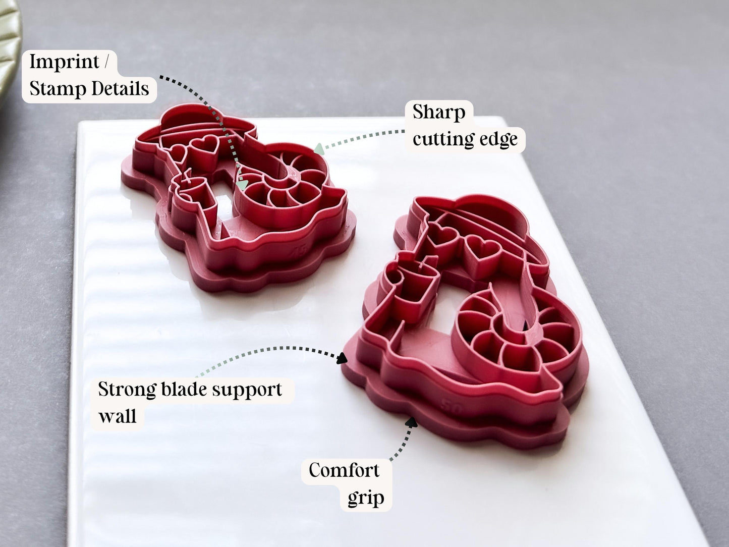Side profile of mirrored beach ghost polymer clay cutters showing sharp cutting edges, strong blade support walls, detailed imprint features and comfortable grip handles. UK-made tools for Summerween jewellery and polymer clay crafting.