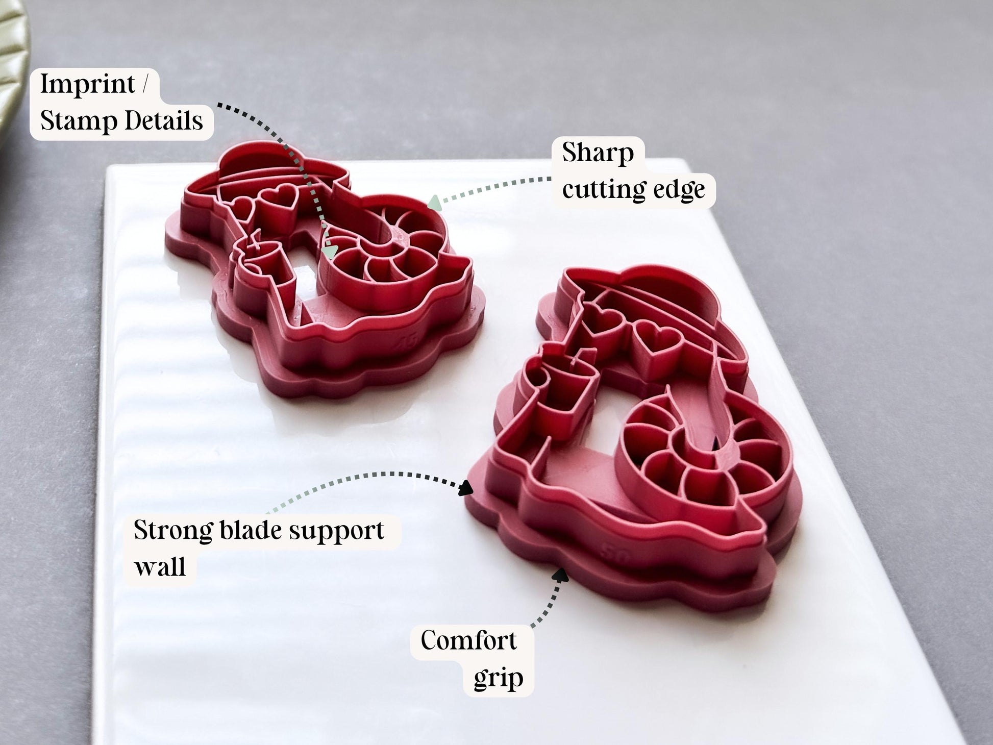 Side profile of mirrored beach ghost polymer clay cutters showing sharp cutting edges, strong blade support walls, detailed imprint features and comfortable grip handles. UK-made tools for Summerween jewellery and polymer clay crafting.